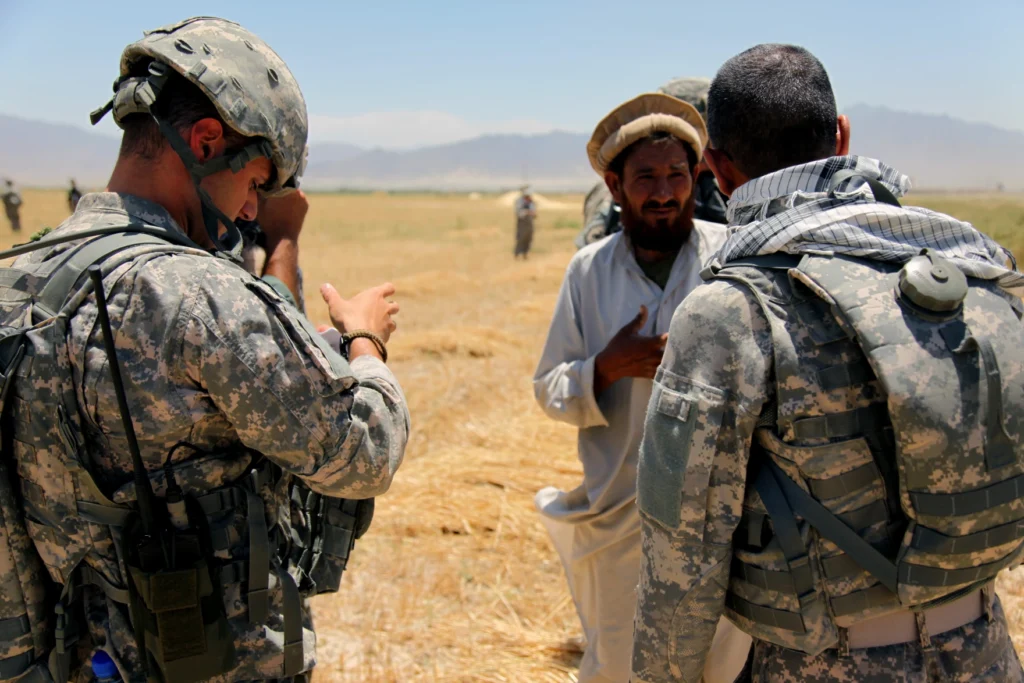 Afghanistan’s $1 Trillion Mineral Wealth: The Resource Behind America’s Longest War 2 An Afghan interpreter helps a U.S. soldier
